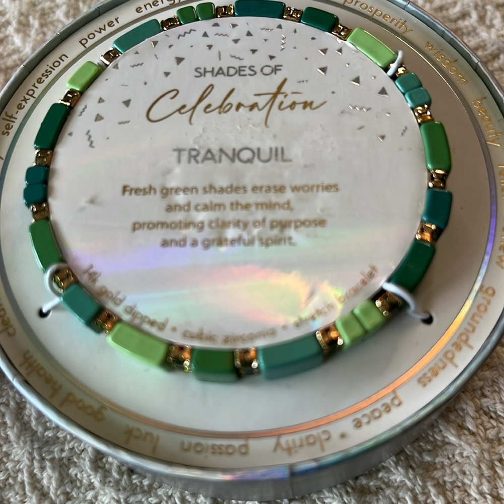 Shades of Celebration bracelet -new in box, tranquil greens calm & erase worries